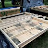 Starting to frame the next wall on some saw horses next to the trailer.
